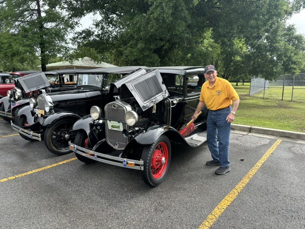 Owner with Model A coupe